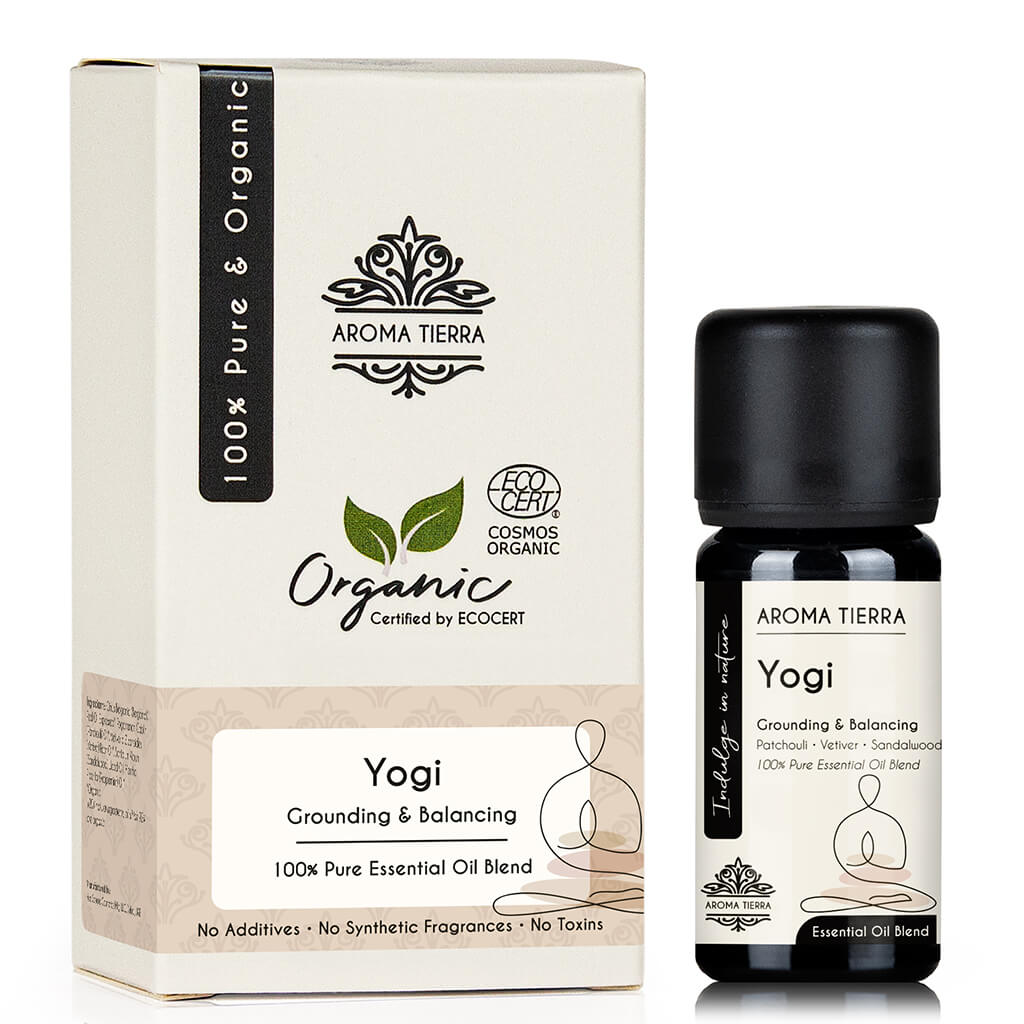Aroma Tierra Organic Yogi essential oil blended with patchouli, vetiver, sandalwood.