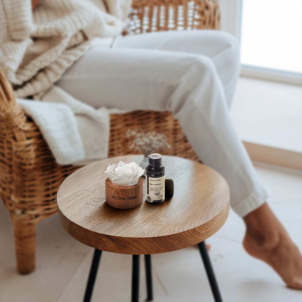 cera flora aroma diffuser with essential oil on living room table