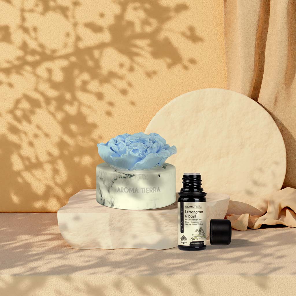 cera flora blue flower ceramic diffuser with lemongrass & basil oil in sunlit room