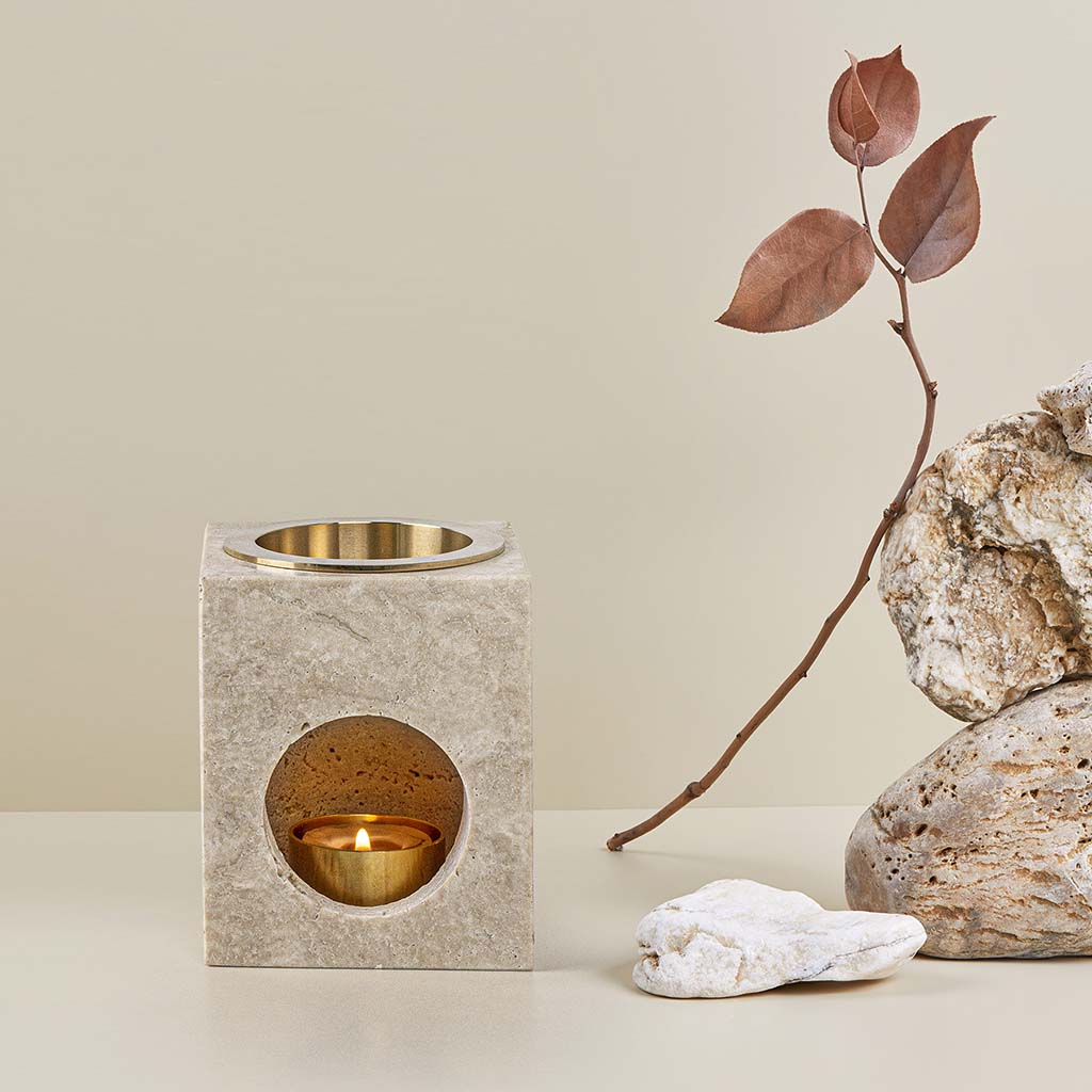 Aroma Tierra Odyssey made of Travertine Stone diffuser with attractive earth-tone colors, unique textures, and urbane brass oil dish