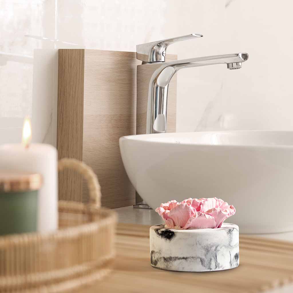 cera flora ceramic essential oil diffuser placed in washroom for home aroma