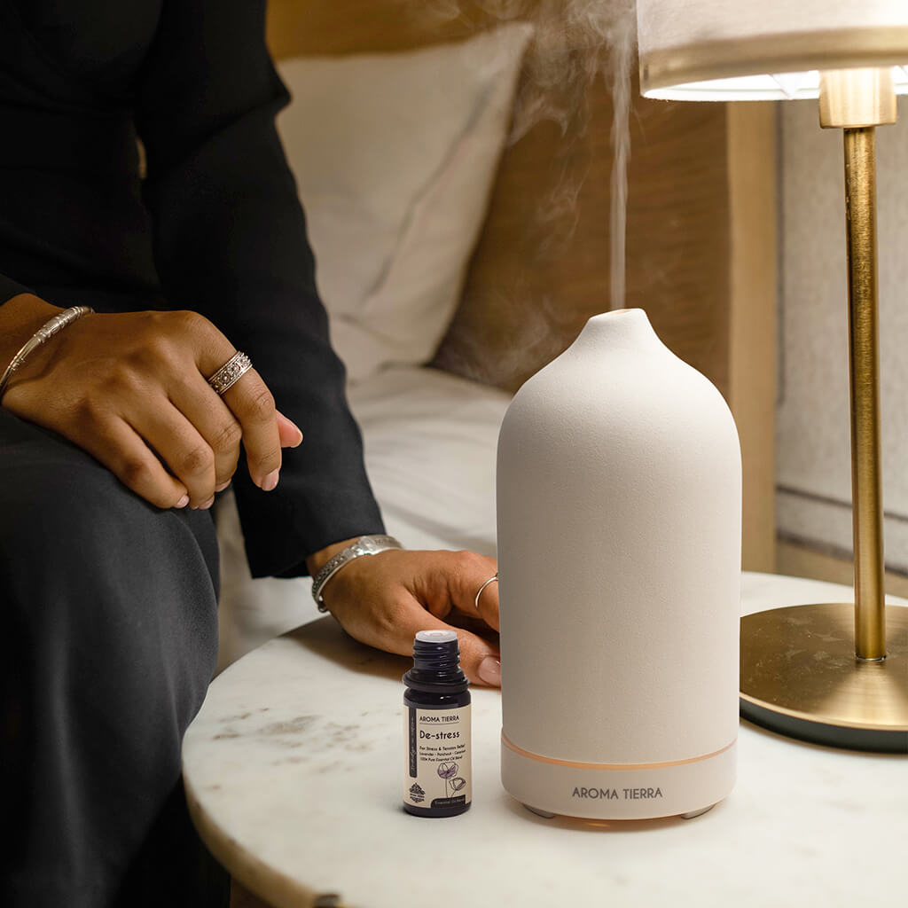 Aroma Tierra De stress essential oil blended with organic lavender, patchouli, geranium. 