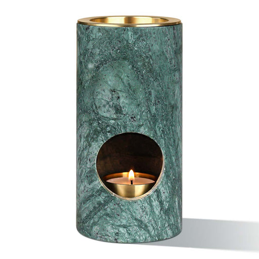Aroma Tierra Eden green marble essential oil candle burner — front view with lit tea-light and brass dish