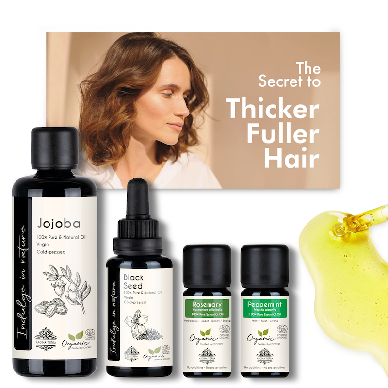 Aroma Tierra hair growth set with Jojoba, black seed, peppermint, rosemary essential oils.